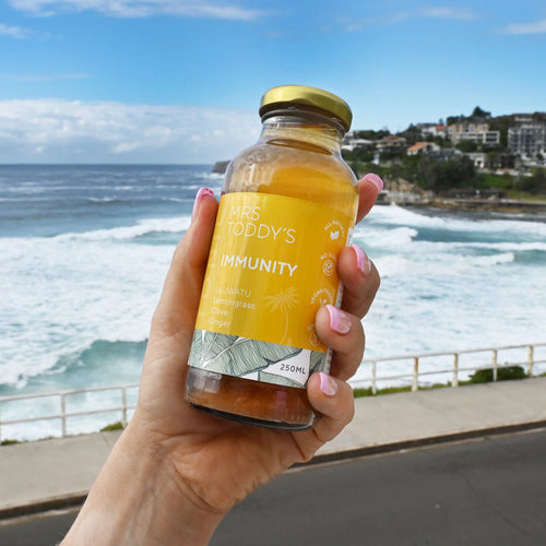 Shelf-stable natural tonic with turmeric and ginger crafted for daily wellness rituals